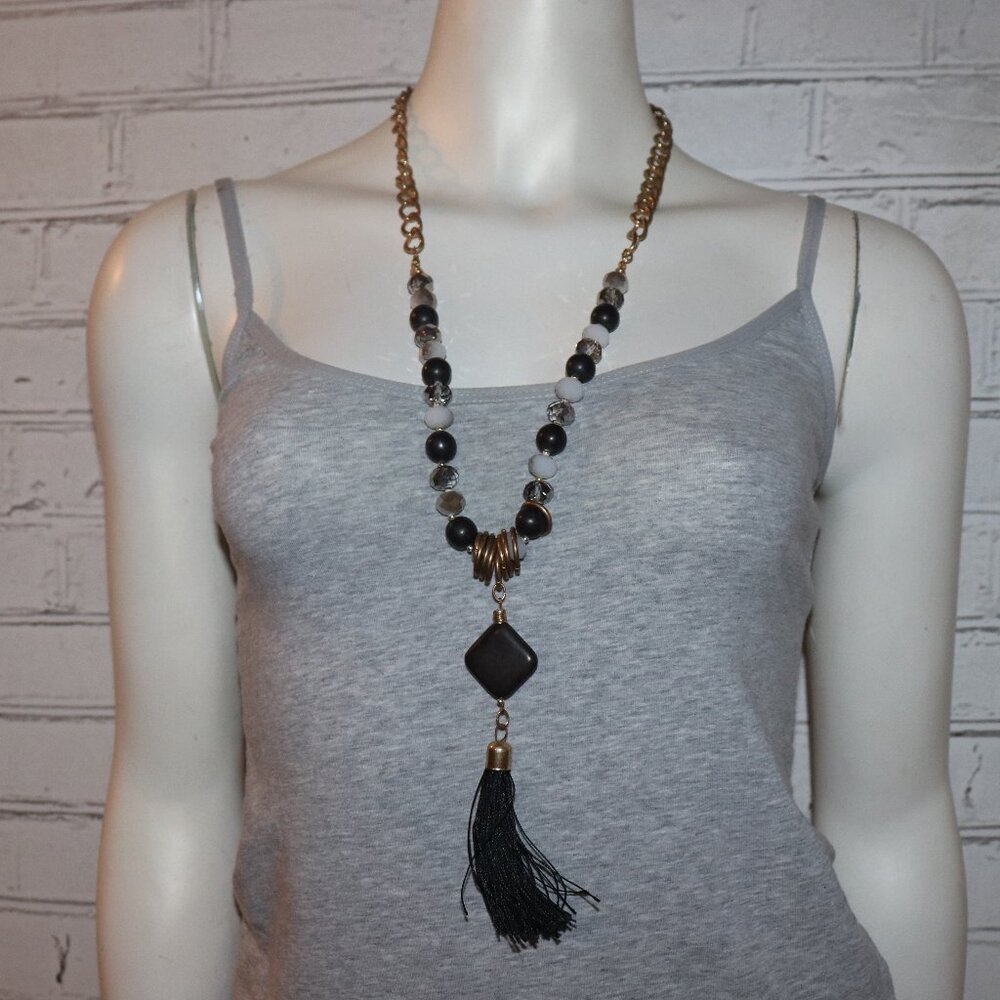Beautiful gold, white and black stone beaded statement necklace with tassel